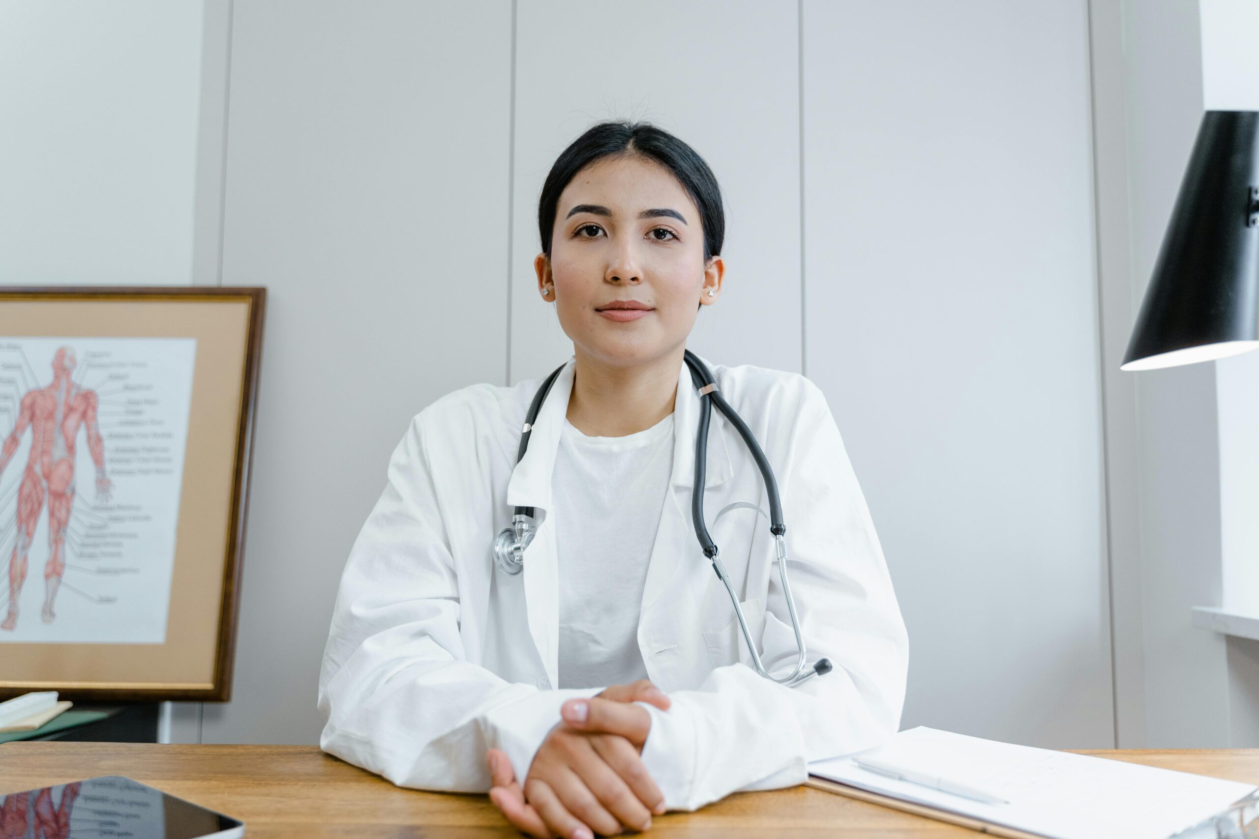 female doctor sitting at desk